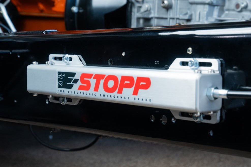 E-Stopp silver actuator installed on a chassis frame rail