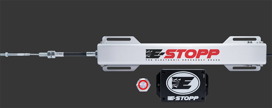 An overhead view of the E-Stopp electronic emergency brake kit with silver billet button