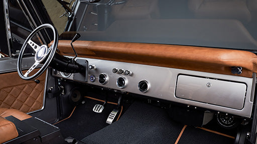 Dashboard of the Highline Classics custom silver Bronco